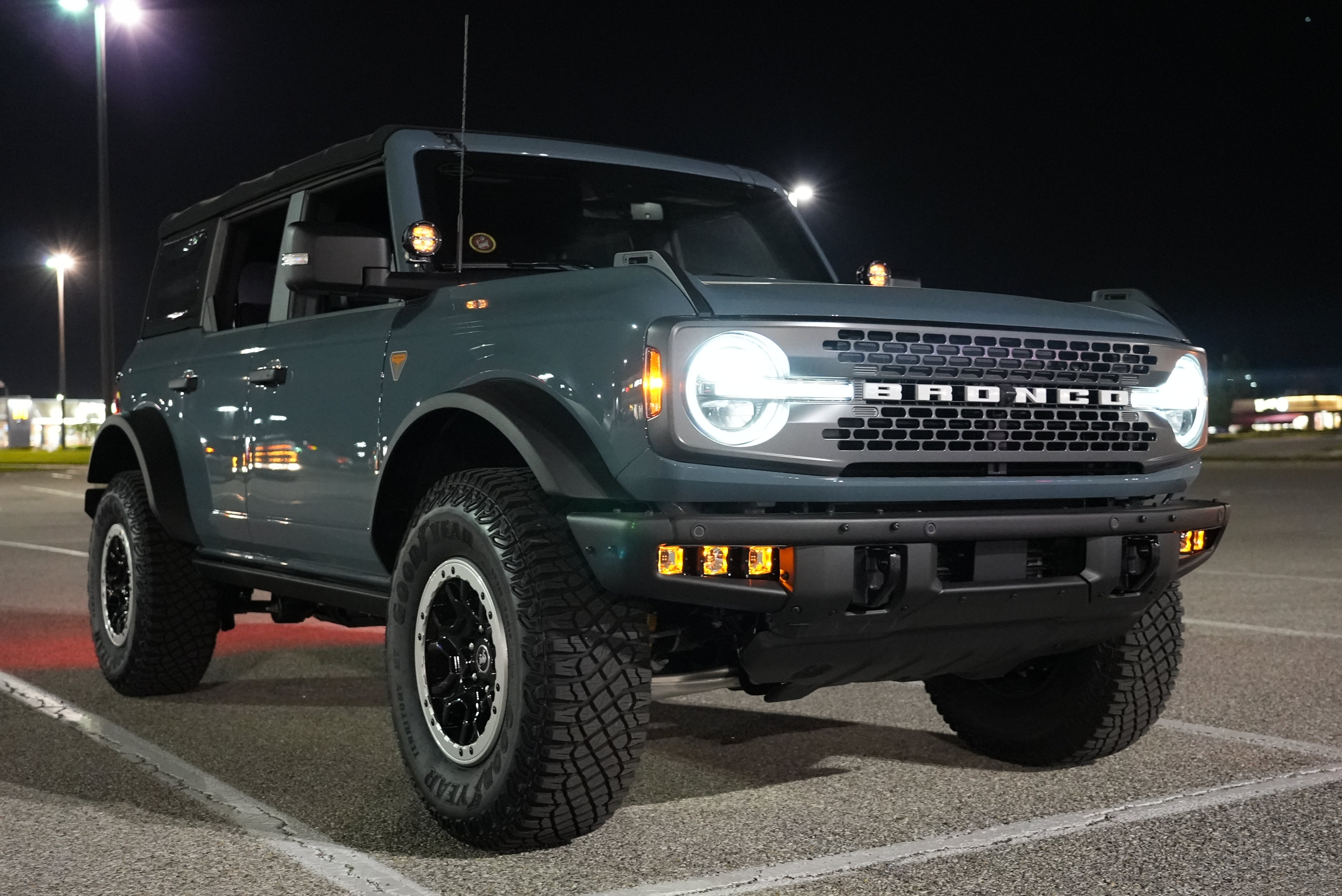 ford bronco with modular bumper in a parking lot