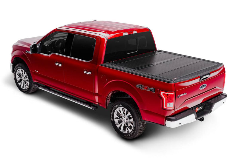 BAKFLIP F1 2015-2019 F-150 on a RED supercrew F-150 completely closed on the bed 