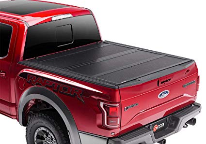 BAKFLIP F1 2015-2019 F-150 on a RED supercrew F-150 Raptor completely closed on the bed 