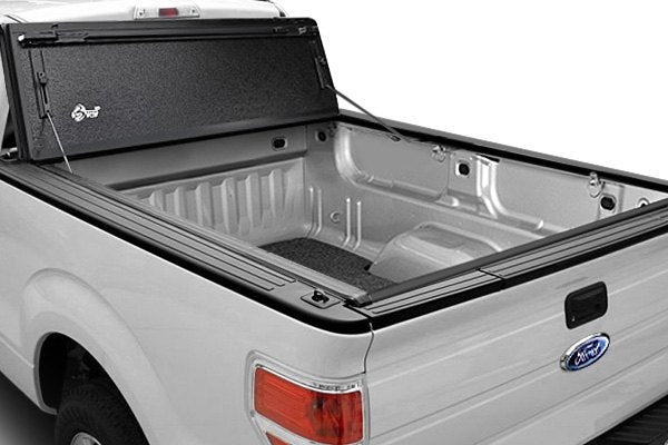 BAKFlip FiberMax Bed Cover 2015-2019 F-150 on a white F-150 completely flipped open 