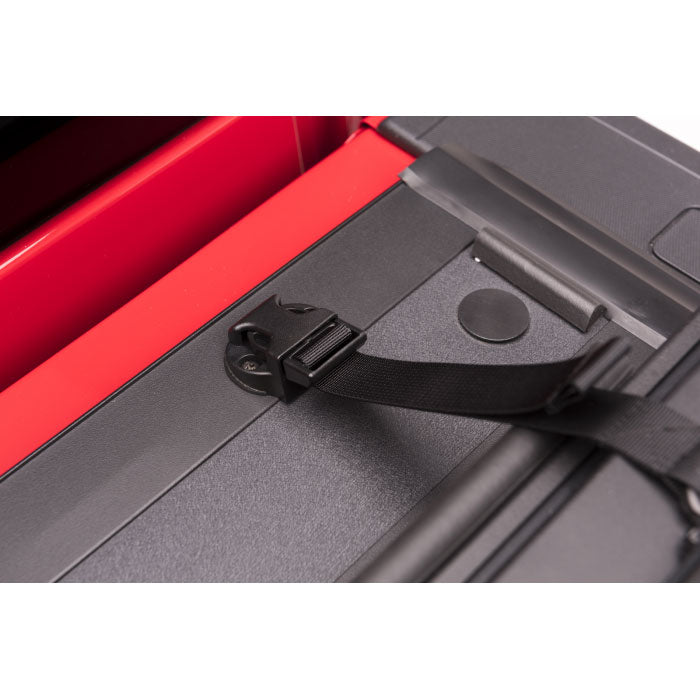 BAKFlip MX4 Bed Cover F-150 2015-2019 on a red F-150 showing the clip that holds the cover down