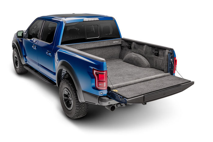 Bed Rug shown in a Raptor bed with open tailgate  