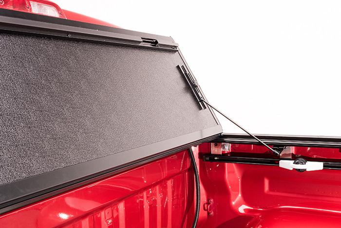 BAKFlip G2 Bed Cover 2015-2019 F-150 completely flipped open on a Red F-150