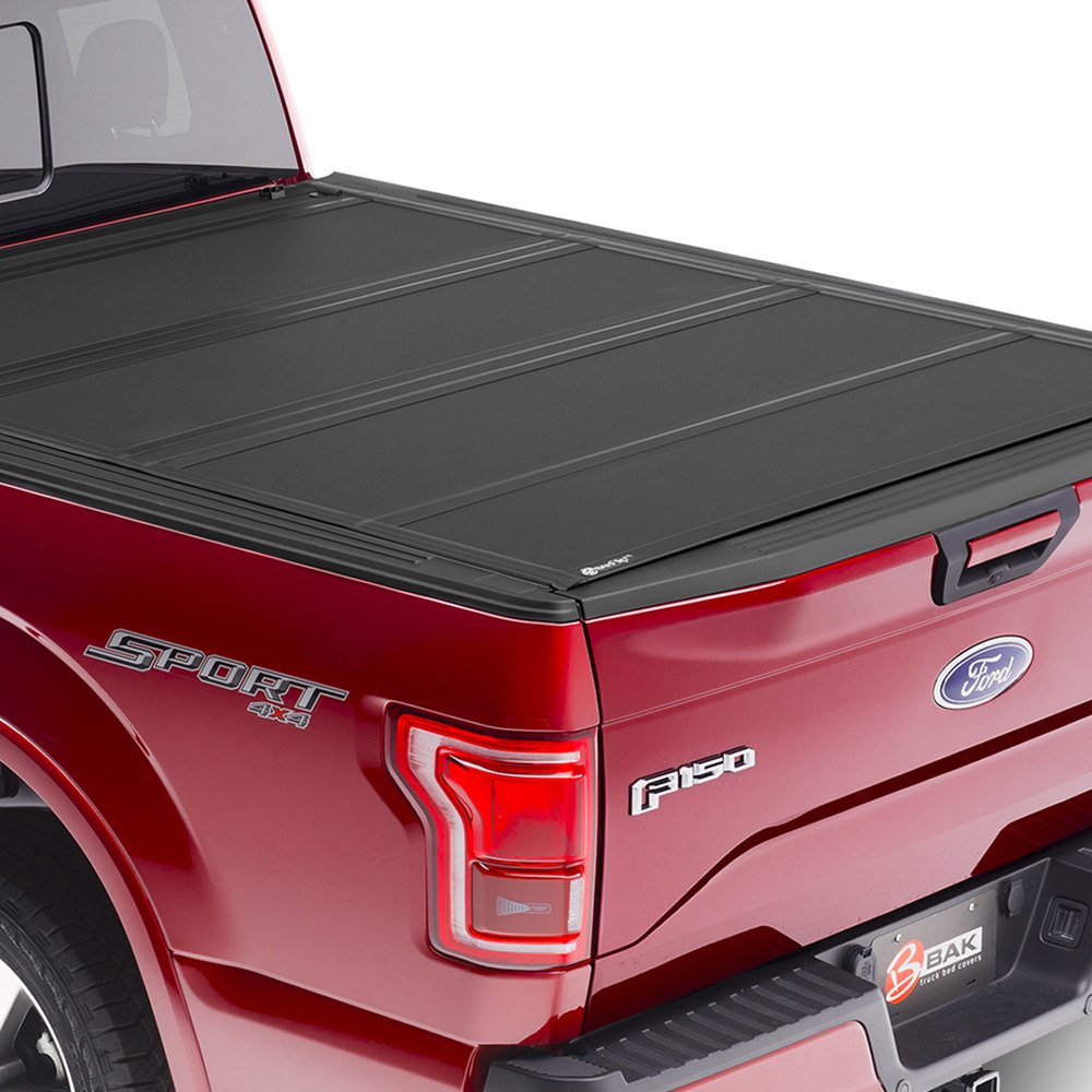 BAKFlip MX4 Bed Cover F-150 2015-2019 on a Red F-150 completely closed covering the bed 